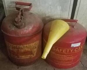 lot 74 image: 2 VINTAGE METAL GAS CANS IN STYLESSIZES SHOWN. YOU ARE BIDDING BY THE PIECE