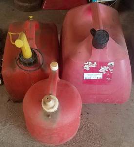lot 110 image: THREE GAS CANS AS SHOWN. YOU ARE BIDDING BY THE PIECE