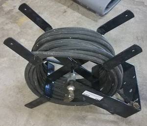 lot 142 image: AIR HOSE WITH REEL AS SHOWN.
