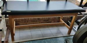 lot 16 image: MASSAGE TABLE IN STYLE AND CONDITION SHOWN.