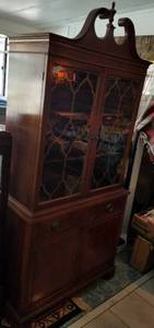 lot 23 image: VINTAGE CURIO CABINET WITH DUAL GLASS TOP DOORS IN STYLECOLORCONDITION SHOWN.