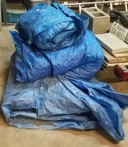 lot 235 image: LOT OF TARPS IN SIZES AND CONDITION SHOWN.