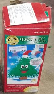 lot 254 image: DANCING DOUGLAS FIR TREE IN BOX AS SHOWN.