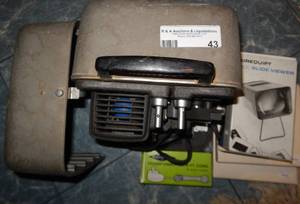 lot 43 image: VINTAGE BELL AND HOWELL PROJECTOR WITH ACCESSORIES AS SHOWN.