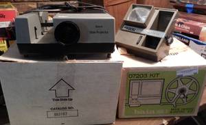 lot 56 image: VINTAGE SEARS PHOTO SLIDE PROJECTOR AND FOCAL AUTO VIEW ACCESSORY AS SHOWN.