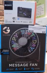 lot 57 image: SONY CYBERSHOT WX350 AND PROGRAMMABLE LED MESSAGE FAN AS SHOWN.