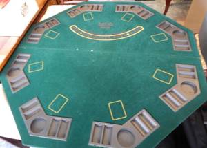 lot 58 image: FOLDABLE CARD TABLE TOPPER IN STYLECOLORCONDITION SHOWN WITH STORAGECARRY BAG.