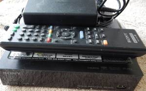 lot 577 image: SONY NETWORK MEDIA PLAYER MODEL SMP-N100 WITH REMOTE CONTROL AS SHOWN.
