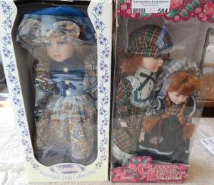 lot 584 image: 2 COLLECTABLE PORCELAIN DOLLS IN BOXES AS SHOWN. YOU ARE BIDDING BY THE PIECE