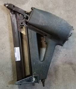 lot 388 image: SENCO NAIL GUN AS SHOWN.