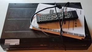 lot 478 image: TOSHIBA DVD  VCR PLAYER MODEL D-VR610KU WITH REMOTE CONTROL AS SHOWN.