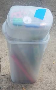lot 528 image: PLASTIC STORAGE CONTAINER WITH WRAPPING PAPER AND SUPPLIES AS SHOWN.