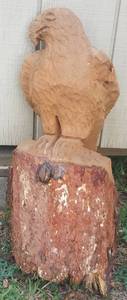 lot 532 image: EAGLE FIGURE CARVED OUT OF A TREE TRUNK IN CONDITION SHOWN.