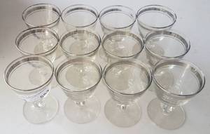 lot 553 image: LOT OF 12 FOOTED GLASSES IN STYLE SHOWN.