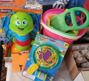 lot 616 image: TOYS INCLUDING A WIGGLIN WATERPILLAR AND MORE AS SHOWN.