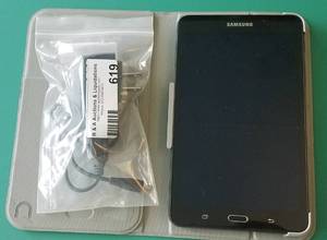 lot 619 image: SAMSUNG TABLET MODEL SM-T280 WITH CASE AND CHARGER AS SHOWN.