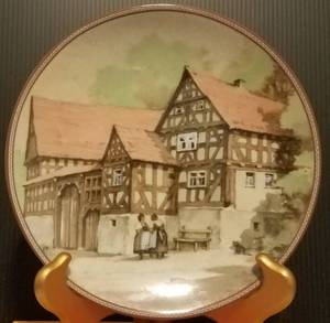 lot 721 image: GERMAN COLLECTIBLE PLATE IN THEMEDESIGNTITLE SHOWN.