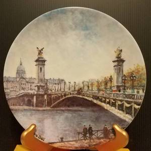 lot 733 image: LOUIS DALI COLLECTIBLE PLATE IN THEMETITLEDESIGN SHOWN.