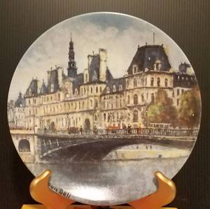 lot 738 image: LOUIS DALI COLLECTIBLE PLATE IN THEMETITLEDESIGN SHOWN.