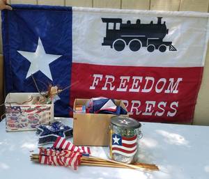 lot 757 image: PATRIOTIC LOT INCLUDING FREEDOM EXPRESS TEXAS FLAG, US FLAGS, AND MORE AS SHOWN.