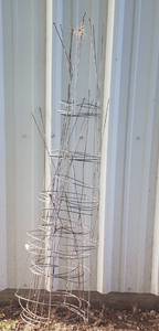 lot 704 image: LOT OF GALVANIZED TOMATO CAGES AS SHOWN.