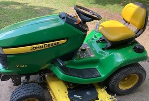 lot 2 image: JOHN DEERE X340 LAWN TRACTOR WITH 54 DECK IN RUNNING CONDITION. THIS UNIT HAS BEEN KEPT INSIDE A BARN SO IT IS IN GREAT OVERALL CONDITION AS SHOWN. CHECK IT OUT