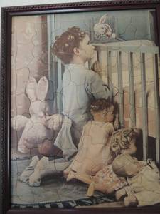 lot 22 image: GENE ERBIT FRAMED PRINT  CHILD PRAYERS AT A CRIB W DOLLS 15x12( NO GLASS)