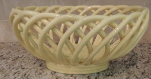 lot 47 image: Yellow CEREMIC BASKET WEAVE Woven Basket 11x5x9 - - owner state it was repaired years ago