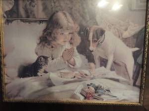 lot 57 image: Art print -GIRL Praying  over lunch with puppy & kitten on bed C. Burten Barber 1894
