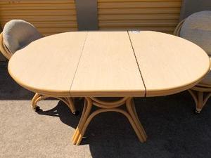 lot 29 image: Bamboo Style Dining Table with 2 leaves,  4 Rolling Chairs TABLE SIZE IS  42 round,  1 leaf 58  X 42,   2 leaves 74X 42