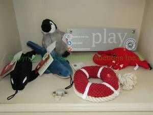 lot 29 image: Fluff and Tuff, Planet Dog, and Patchwork dog toys