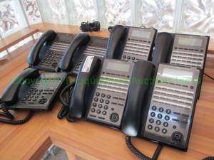 lot 99 image: NEC model IP7WW-24TXH-B1 desk phones, 7 count