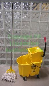 lot 180 image: Rubbermaid plastic mop bucket and mop