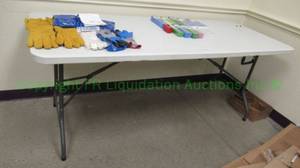 lot 148 image: Plastic folding table, 29 x 71 x 29