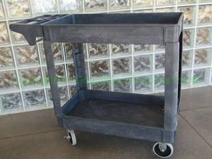 lot 61 image: Plastic utility cart, includes cupholders