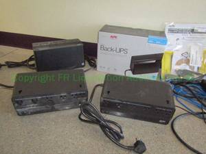 lot 55 image: APC battery back-ups and various computer cords
