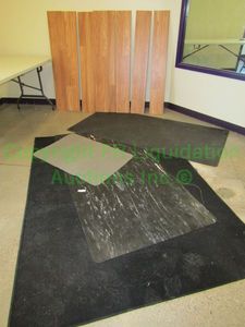 lot 66 image: Rubber floor mats and wood floor panels