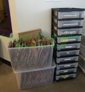 lot 60 image: Clip boards and plastic storage cabinet