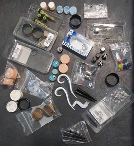 lot 137 image: Assorted ear piercing supplies