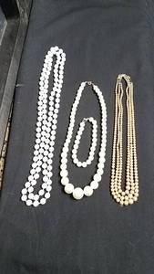 lot 201 image: pearl type necklaces and bracelet