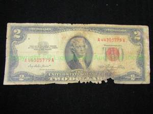 lot 502 image: 1953 U.S. silver certificate two dollar red note. Rough condition