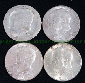 lot 511 image: Silver pre 1965 Kennedy half dollars (one is in rough condition). Bid is times the quantity