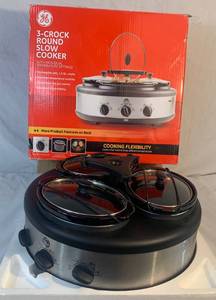 lot 9 image: GE 3 Crock round slow cooker