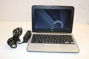 lot 20 image: Hp Chromebook w power adapter (keyboard not working)
