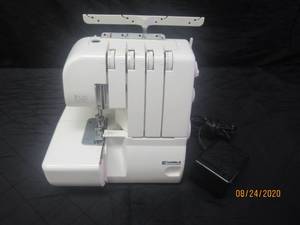 lot 9 image: KENMORE SEWING MACHINE IN WORKING CONDITION