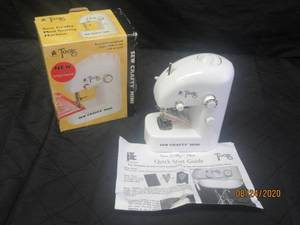 lot 16 image: SEW CRAFTY MINI SEWING MACHINE IN BOX