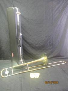 lot 24 image: YAMAHA BRASS TROMBONE SKB  WITH CASE