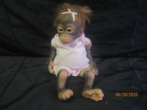 lot 184 image: POSEABLE SO TRULY REAL BABY MONKEY DOLL