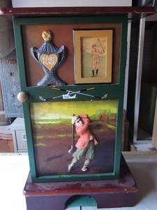 lot 160 image: Golf Table 3 tier shelving 1 door golf design brown and green  25x16