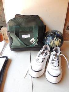 lot 186 image: Brunswick bowling ball in bowling bag includes Brunswick bowling shoes size 11.5 mens
